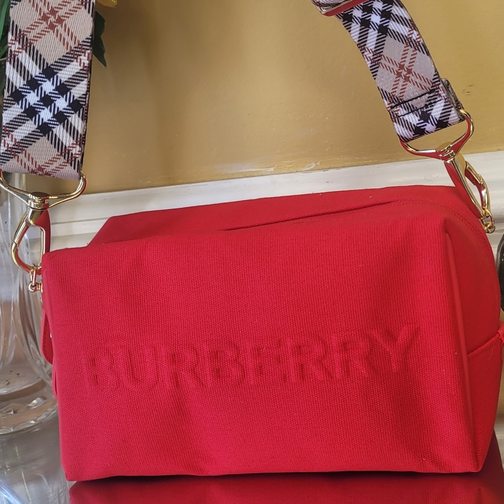 Burberry Pouch converted into to shoulder bag or cross body